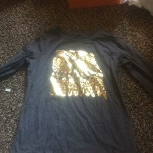 Long sleeve with foil design.